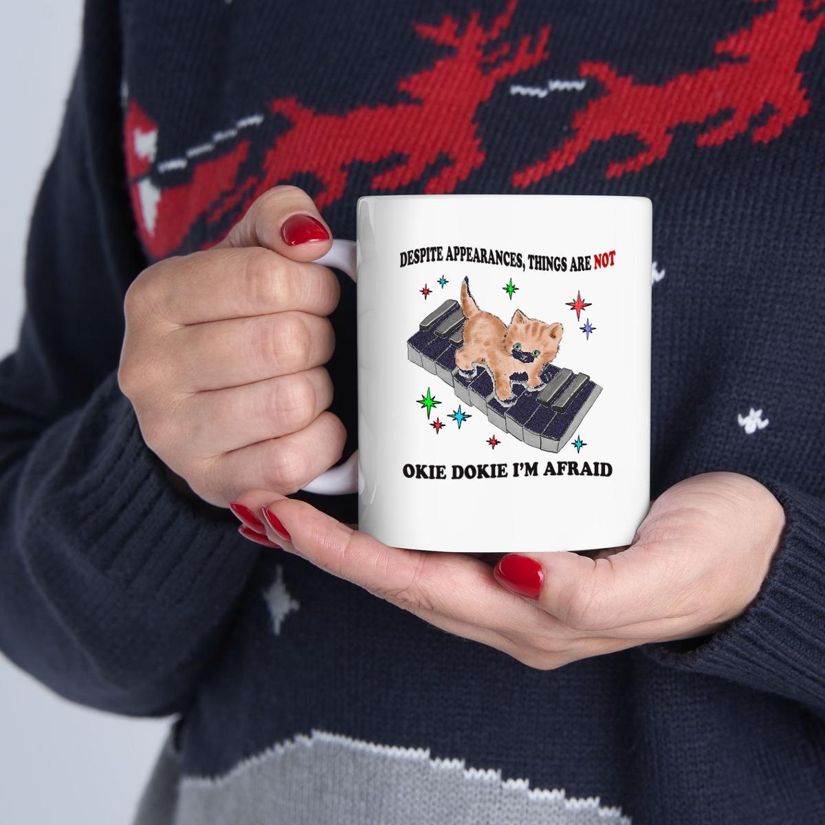 Despite Appearances Things Are Not Okie Dokie Im Afraid Kitty On Piano Mug